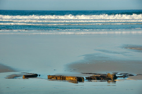 Picture of a wreck almost disappeared in the sand