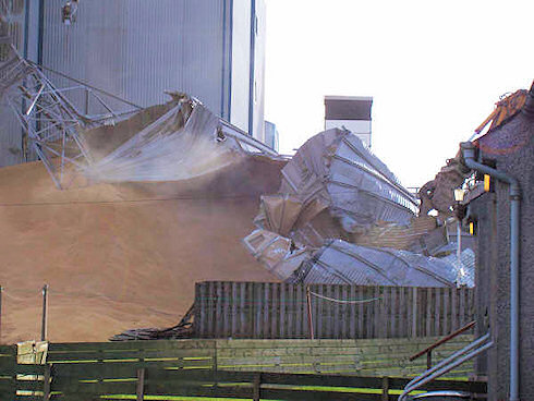 Picture of grain spilling from a collapsed silo