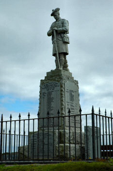Picture of a war memorial with a fence going around it