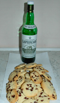 Picture of a pile of shortbread with a bottle of Laphroaig Islay Single Malt