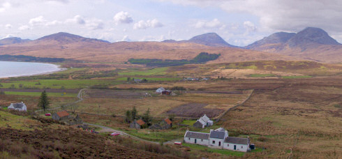 Picture of a farming landscape with hills in the background