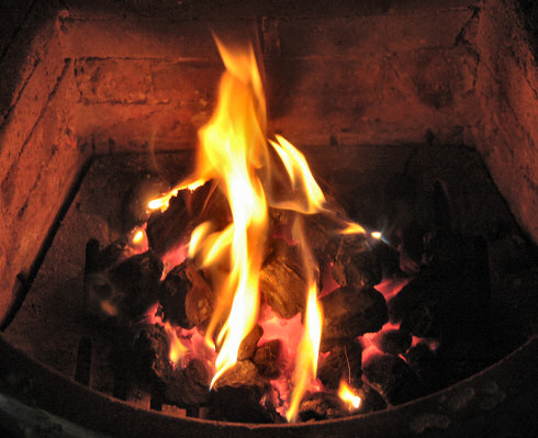 Picture of an open fire in a fireplace