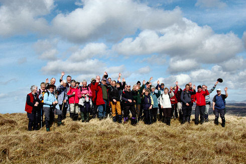 Picture of a group of approx 40 walkers, some waving for the camera