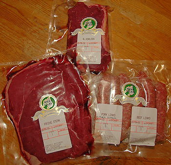 Picture of three vacuum packed items of meat from Meat Islay
