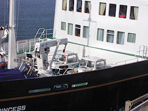 Picture of two tenders in the bow storage area of a small cruise ship