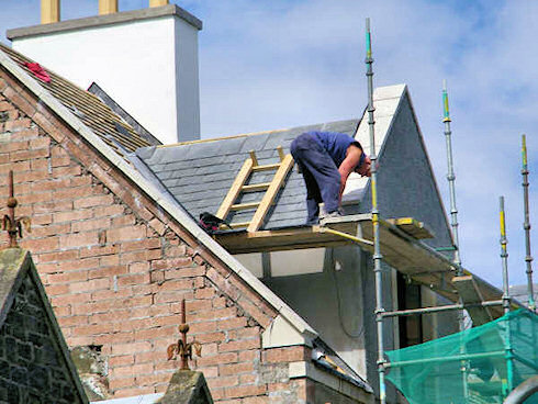 Picture of a dormer roof window under construction