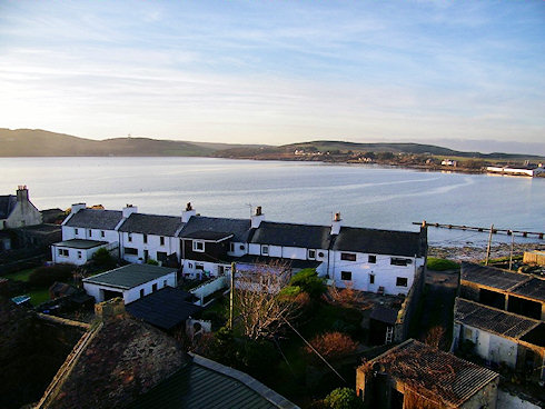 Picture of a view over a bay in the winter afternoon sunshine
