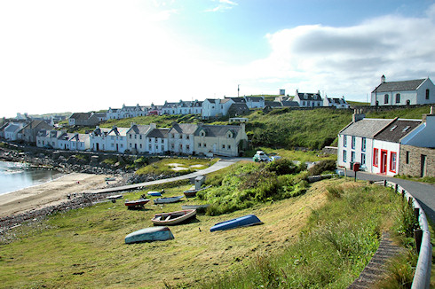Picture of a street along a bay in a coastal village