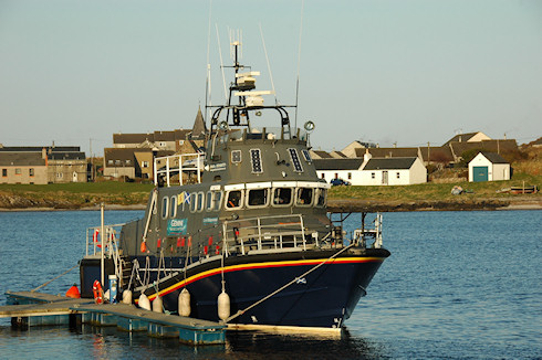 Picture of a converted lifeboat in the evening sun