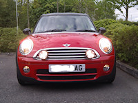 Picture of a red Mini Clubman with spotlights fitted