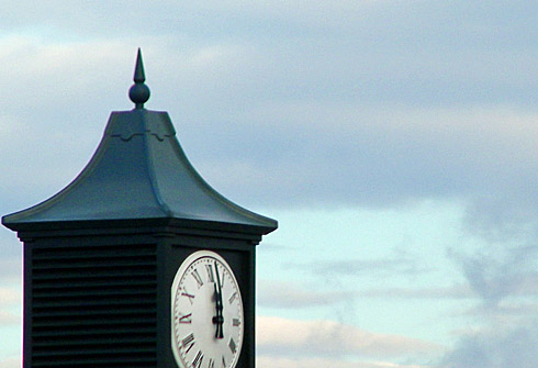 Picture of a roof tower with a clock