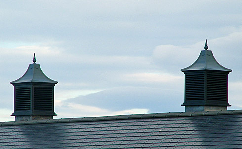 Picture of a roof with two roof towers/vents