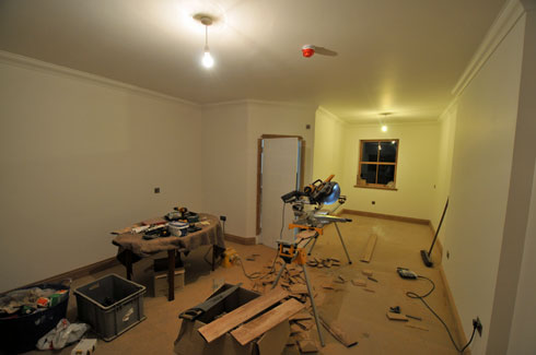 Picture of a view into a hotel bedroom being fitted out
