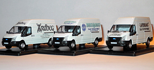 Picture of three van models with Islay distillery logos on them