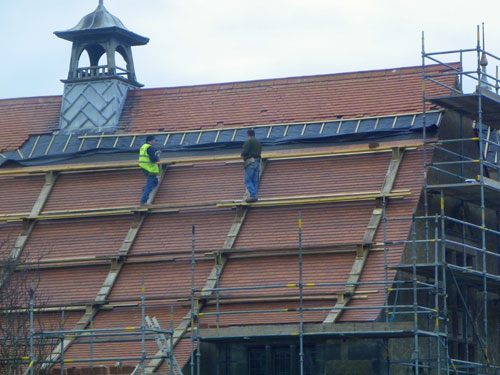 Picture of a roof under repair