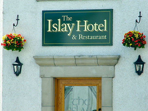 Picture of a sign for The Islay Hotel above the hotel entrance