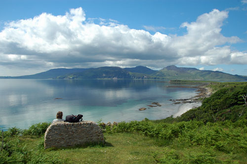 Picture of a view of a coastline overlooking a sound between two islands