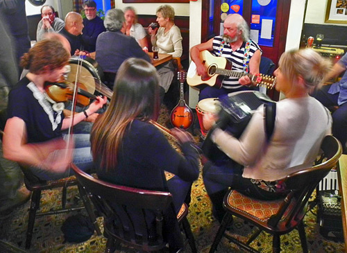 Picture of a group of musicians in a pub