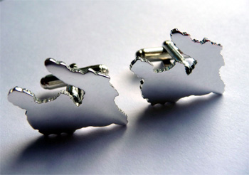 Picture of two silver cufflinks in the shape of the Isle of Islay