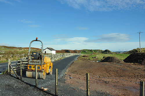 Picture of a roller on an under construction footpath